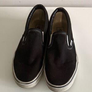 Black canvas Vans slip-ons (7.5M/9W)
